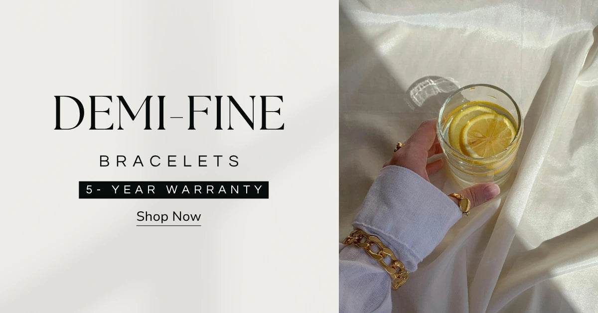 Advertisement for Demi-Fine bracelets with a hand holding a glass of lemonade on a white background.