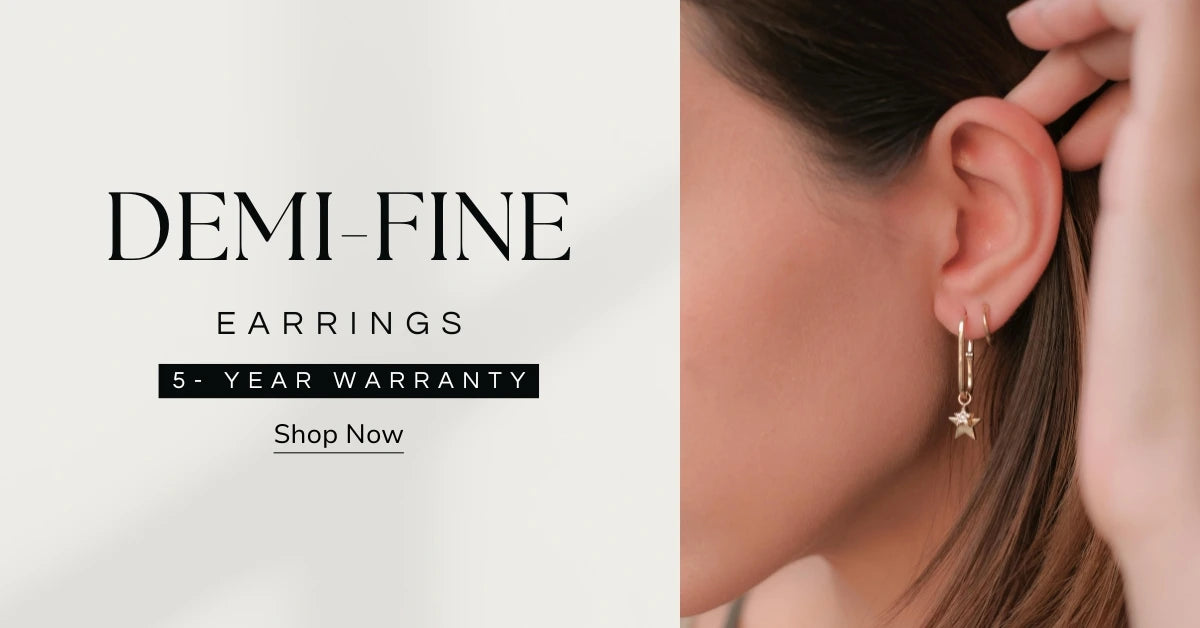 Demi-fine earrings being worn with a promotional text overlay on a white background
