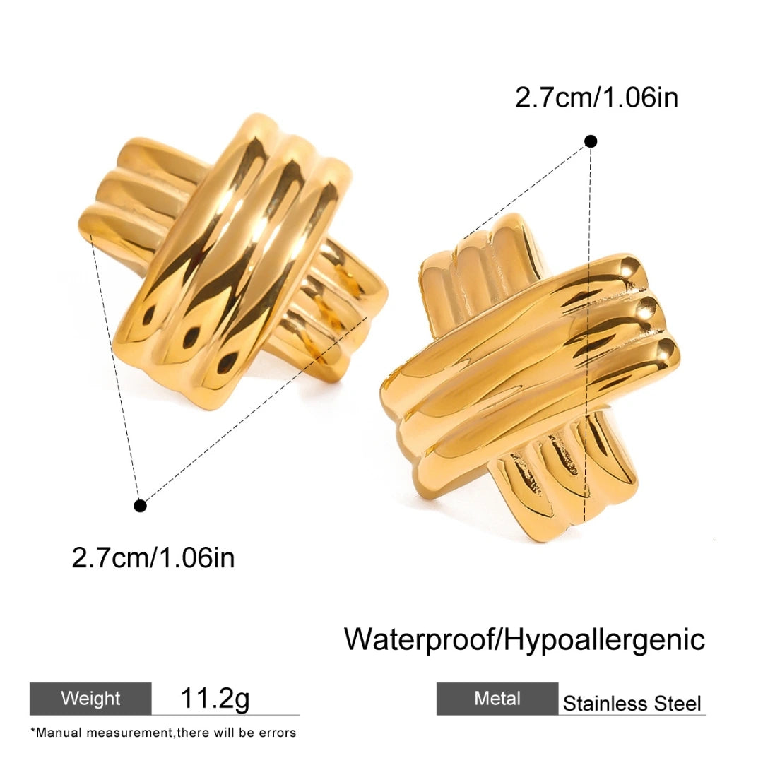 Gold cross-shaped earrings with measurements and material details on a white background