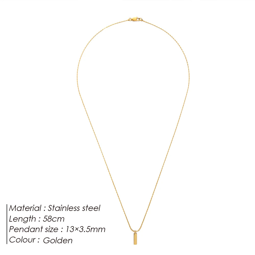 Gold necklace with pendant on a white background