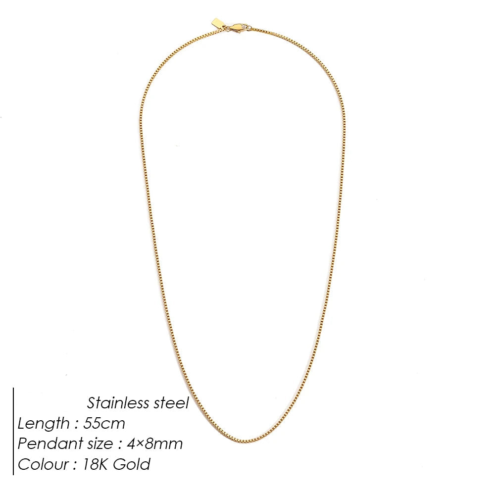 Gold necklace on a white background with product details.