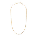 Gold chain necklace on a white background