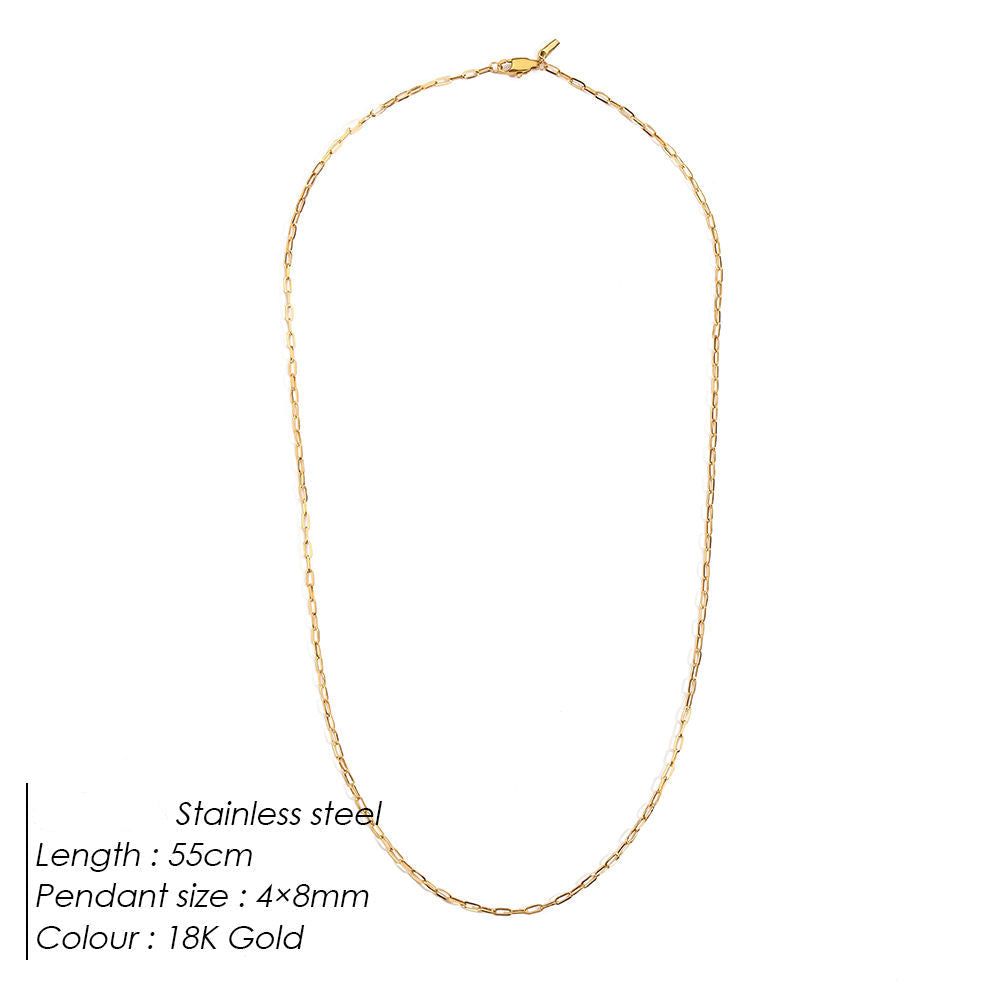 Gold necklace on a white background with product details.