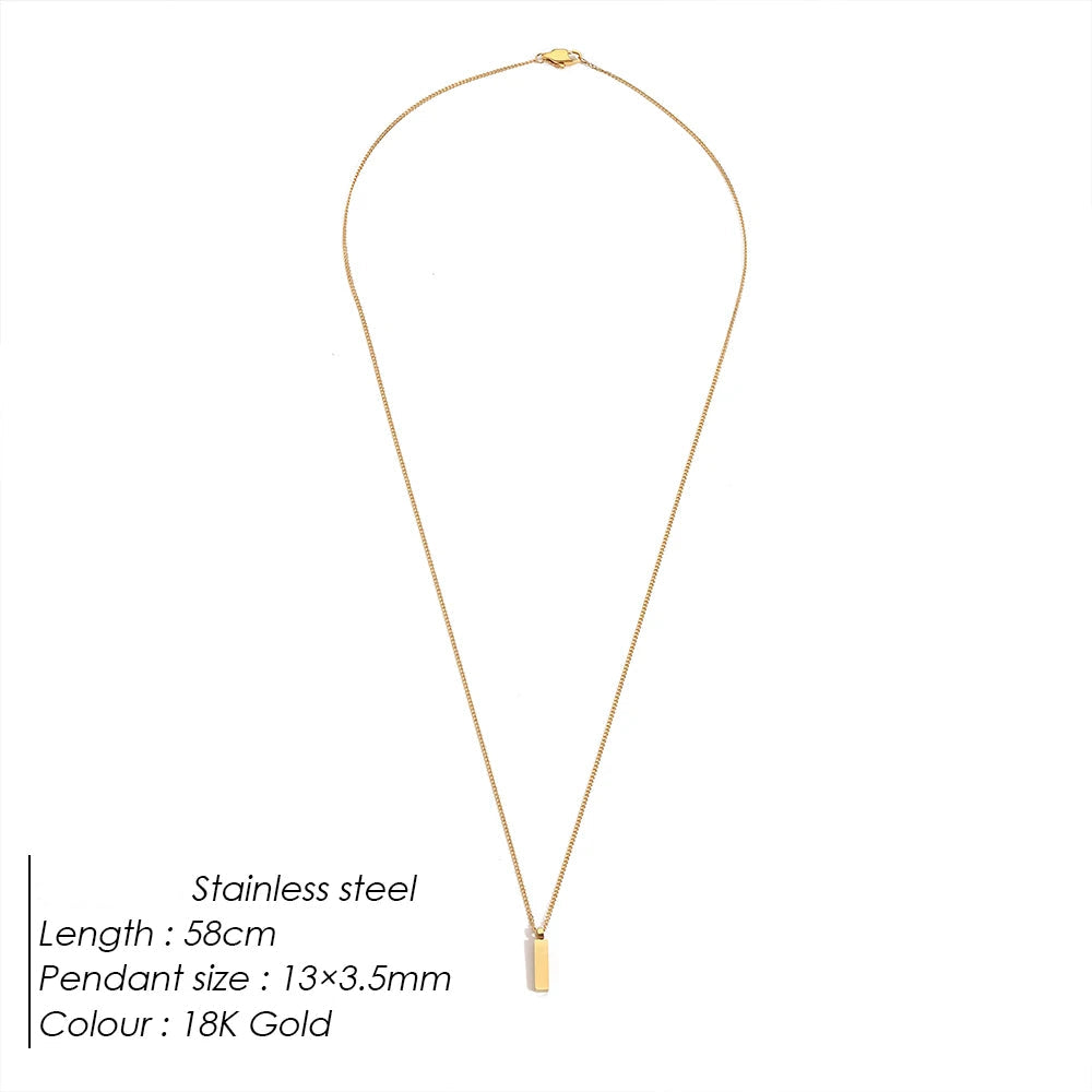 Gold necklace with pendant on a white background