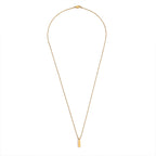 Gold necklace with a small pendant on a white background
