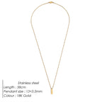 Gold necklace with pendant on a white background