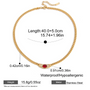 Gold necklace with a red gemstone, showing measurements and material details on a white background.