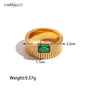 Gold ring with a green gemstone and measurements on a white background, featuring the brand 'CARRYALLCO'.