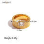 Gold ring with measurements and weight displayed on a white background