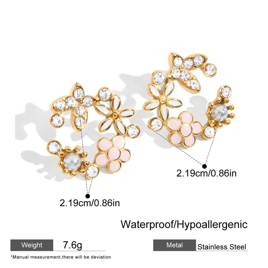 Gold and pink floral earrings with measurements and material details on a white background