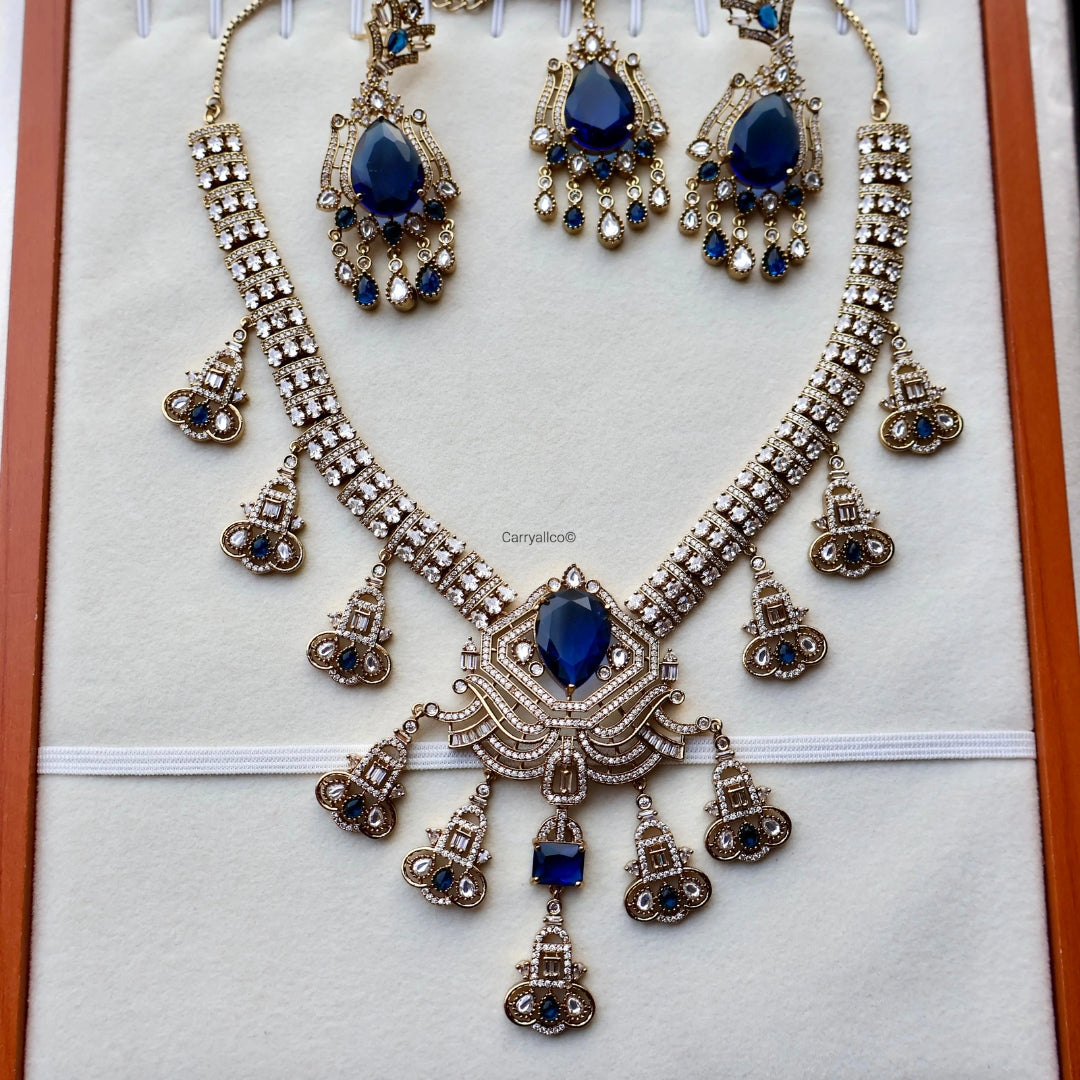 Jewelry set with necklace and earrings on a display card