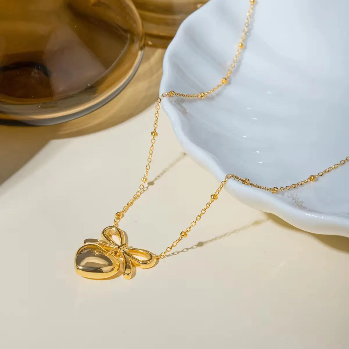 Carryallco 18K Gold Plated Demi-fine Bow Heart Necklace