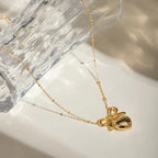 Carryallco 18K Gold Plated Demi-fine Bow Heart Necklace