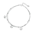 Silver anklet with fan-shaped charms on a white background