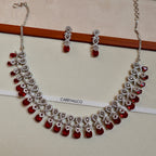 Jewelry set with necklace and earrings on a white background