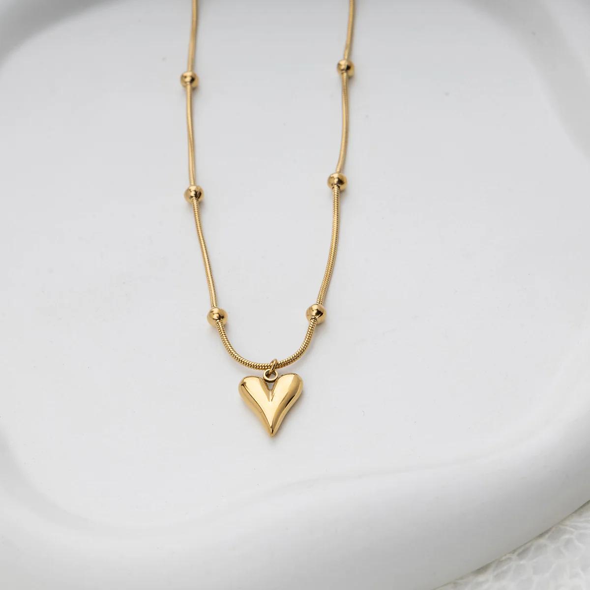 Dagger Heart Pendant Necklace – 18K Gold Plated Carryallco