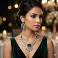 Woman wearing emerald and diamond jewelry in a festive setting