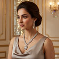 Woman wearing a diamond necklace and earrings in an elegant room.