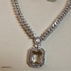 Elegant diamond necklace on a beige background