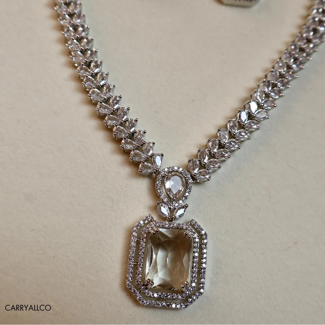 Elegant diamond necklace on a beige background