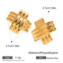 Gold cross-shaped earrings with measurements and material details on a white background