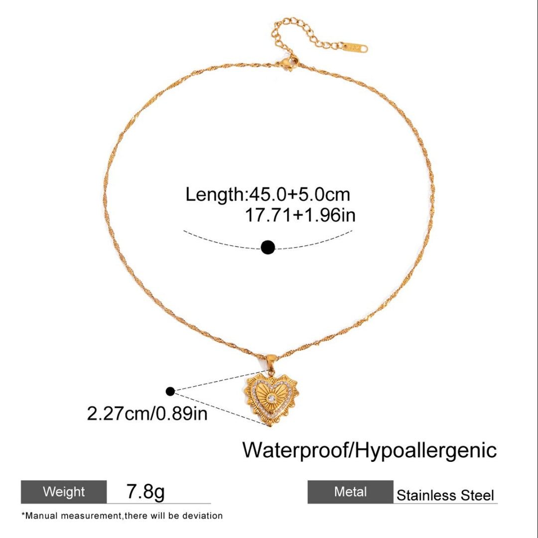 Gold necklace with heart pendant and measurement details on a white background