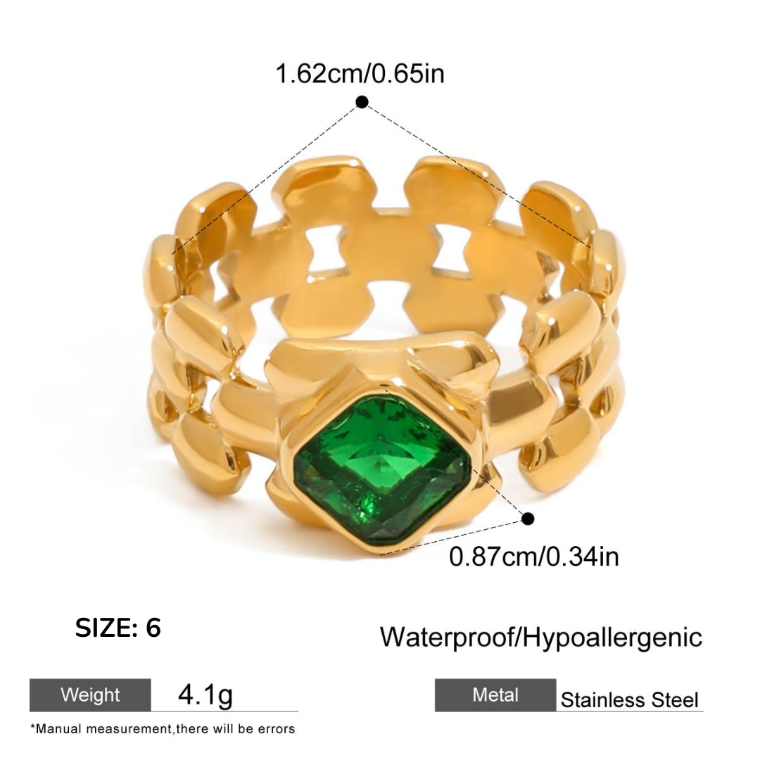 Gold ring with a green gemstone, showing measurements and material details on a white background.