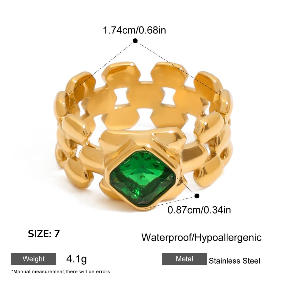 Gold ring with a green gemstone, showing measurements and material details on a white background.