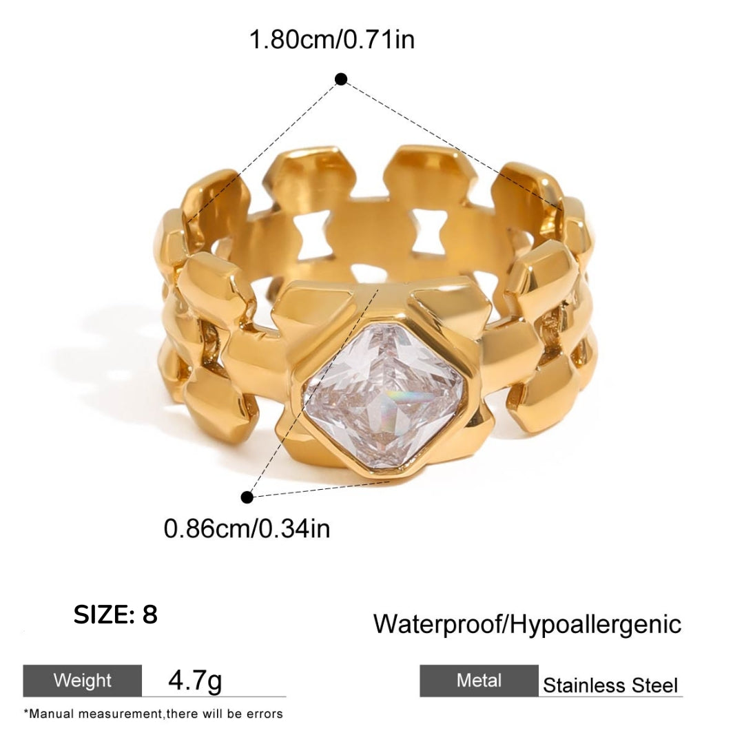 Gold ring with geometric design and measurements on a white background