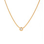 Gold necklace with a small round pendant on a white background