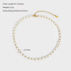 Gold chain necklace with measurement details on a white background