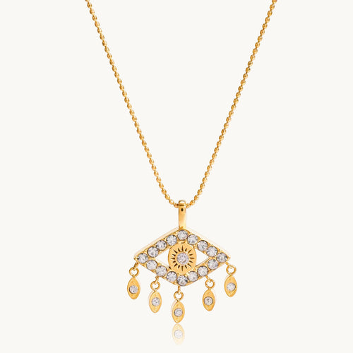Gold necklace with an eye-shaped pendant on a white background