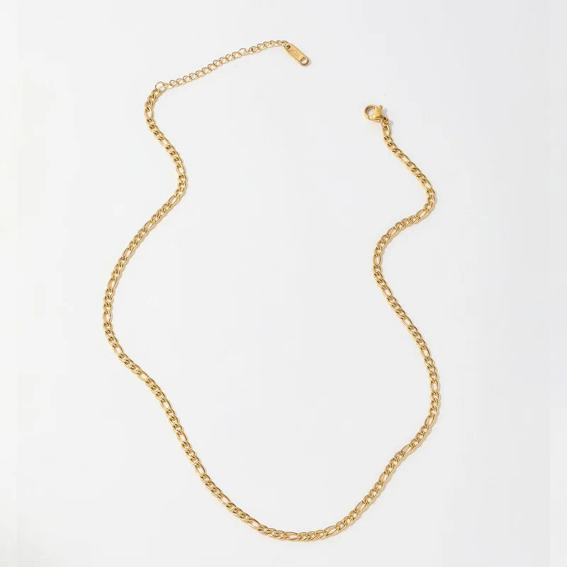 Gold chain necklace on a white background