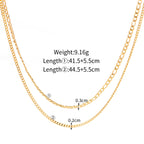 Gold chain necklace with measurements on a white background