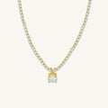 Gold necklace with a diamond pendant on a white background