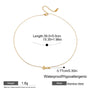 Gold necklace with 'love' pendant on a white background, showing measurements and material details.