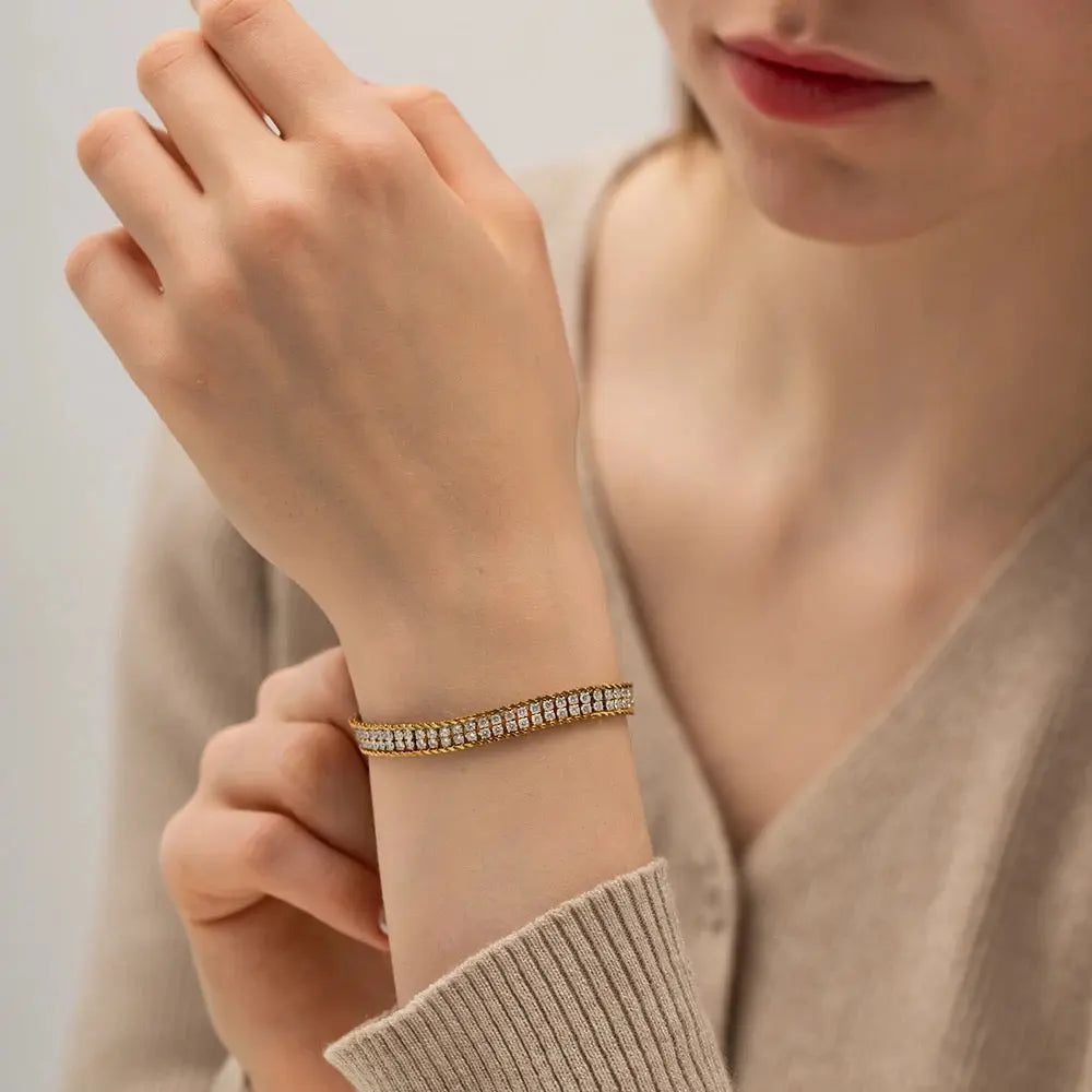 Elegant double-layer bracelet with sparkling cubic crystals, perfect for everyday and occasion wear.