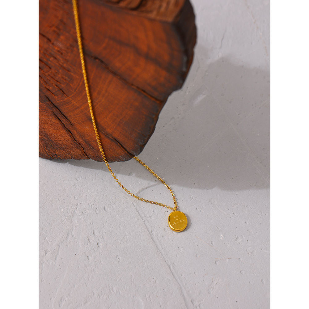 Engraved Oval Pendant Necklace