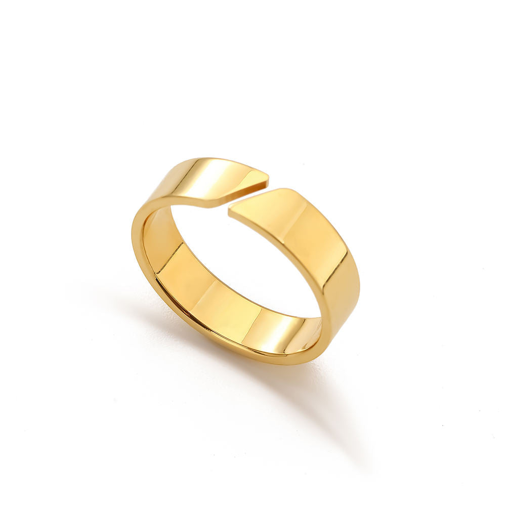 Gold ring on a white background