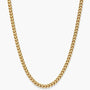 A gold-toned chain necklace with a braided or woven link design, shown against a plain light gray background.
