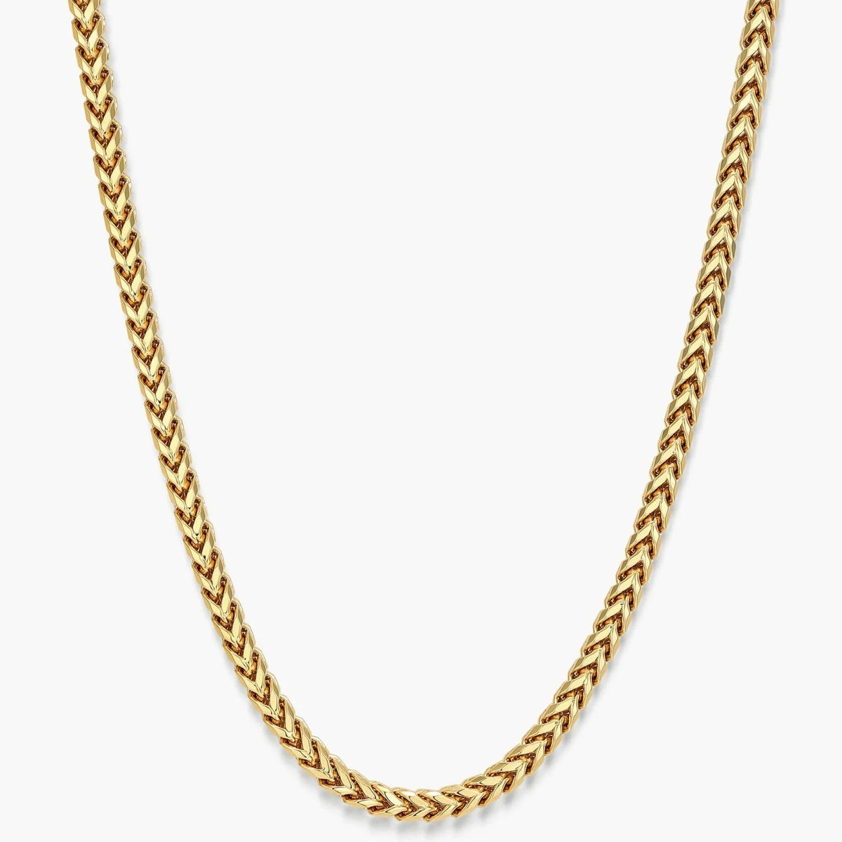 A gold-toned chain necklace with a braided or woven link design, shown against a plain light gray background.