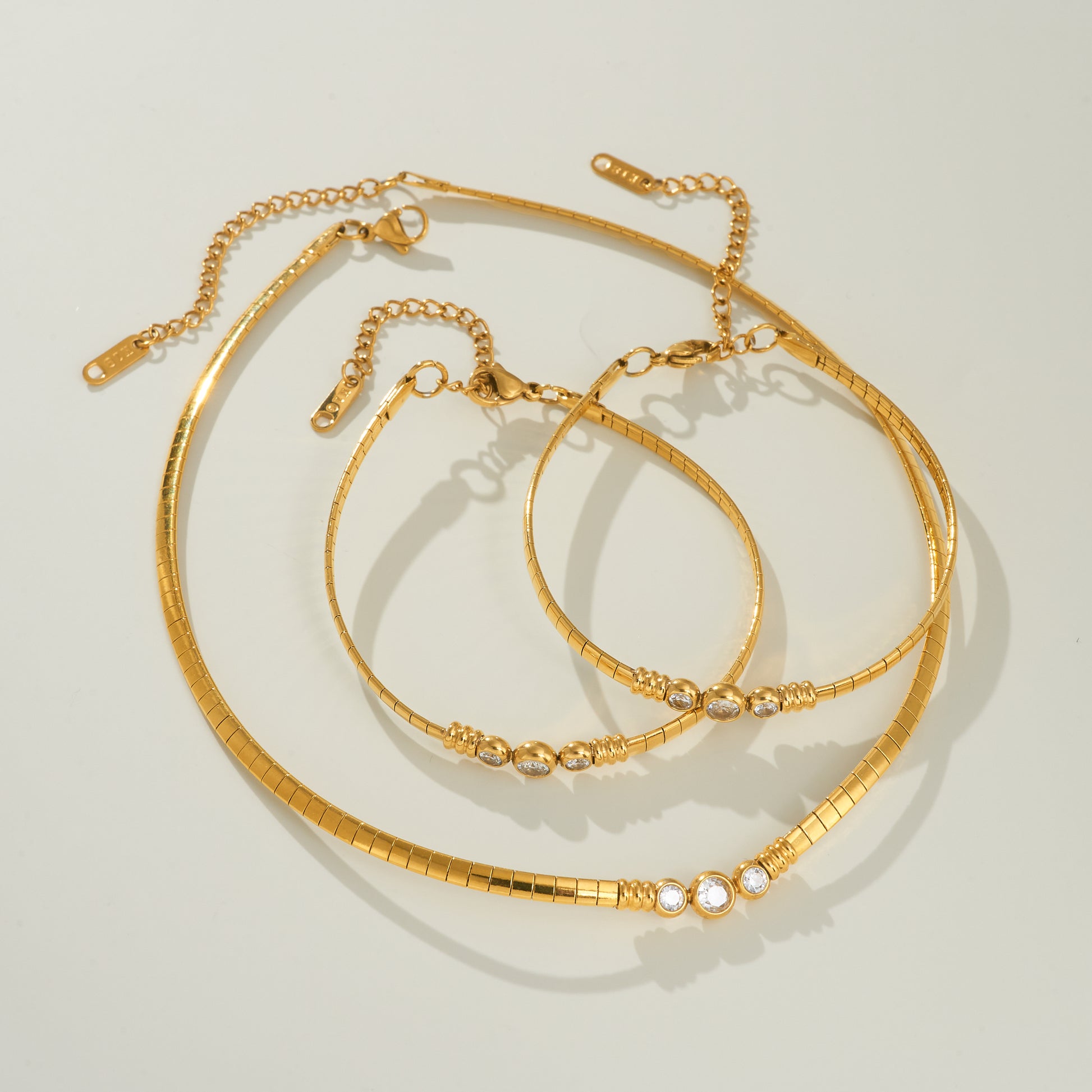 Futuristic Zircon Necklace & Bracelet Set – 18K Gold Plated Demi-Fine