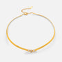 Gold necklace with a small clasp on a white background