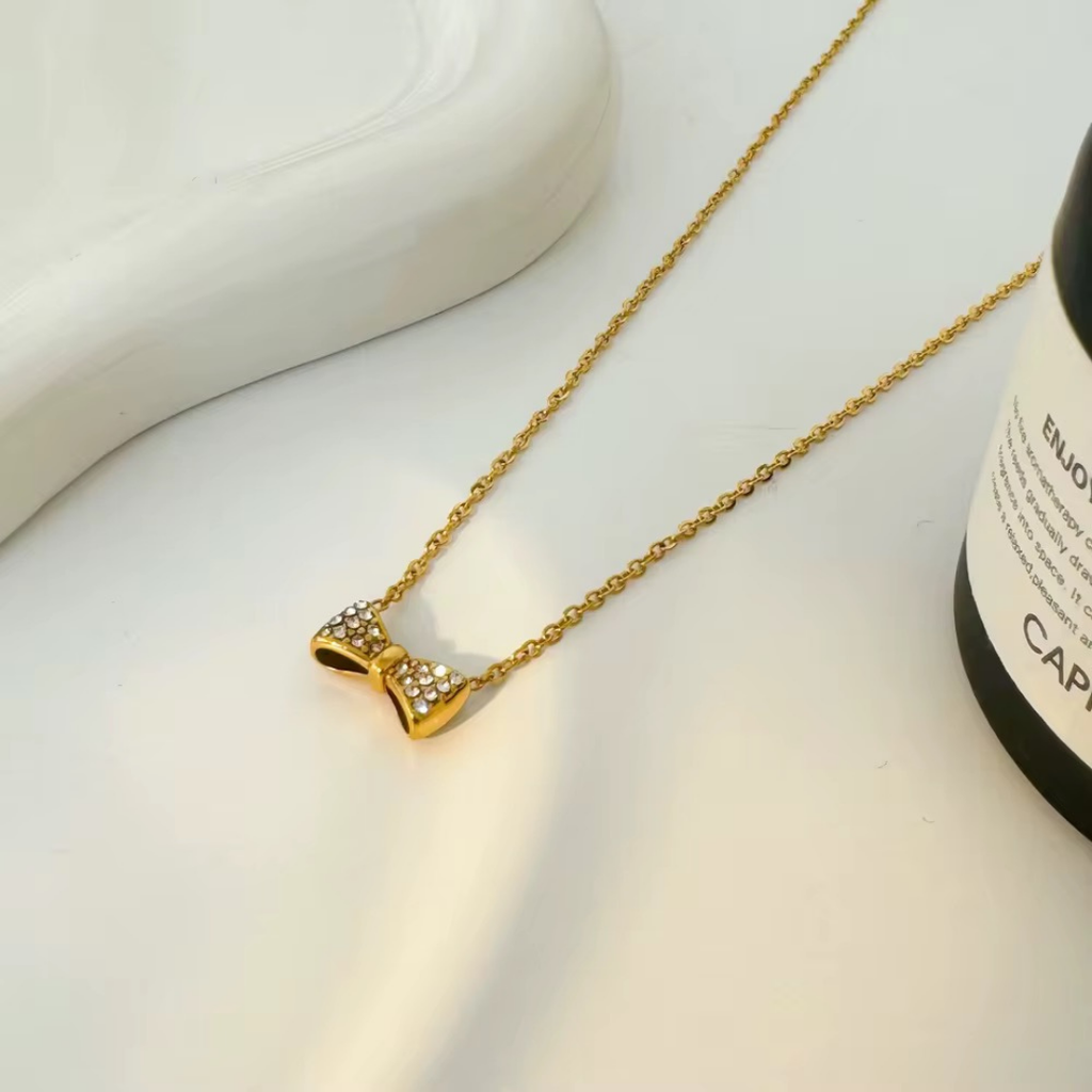 Geometric Bow Brilliant Cut Stone Pendant Necklace CARRYALLCO