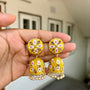 Carryallco Reverese AD Studded Gold Plated Yellow Meenakari Jhumka Earrings Carryallco