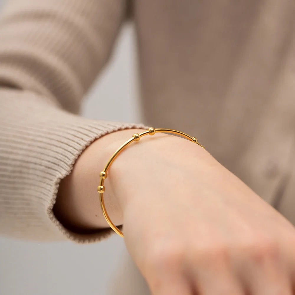 Round Bead Ball Cuff Bracelet – worn on the wrist, close-up