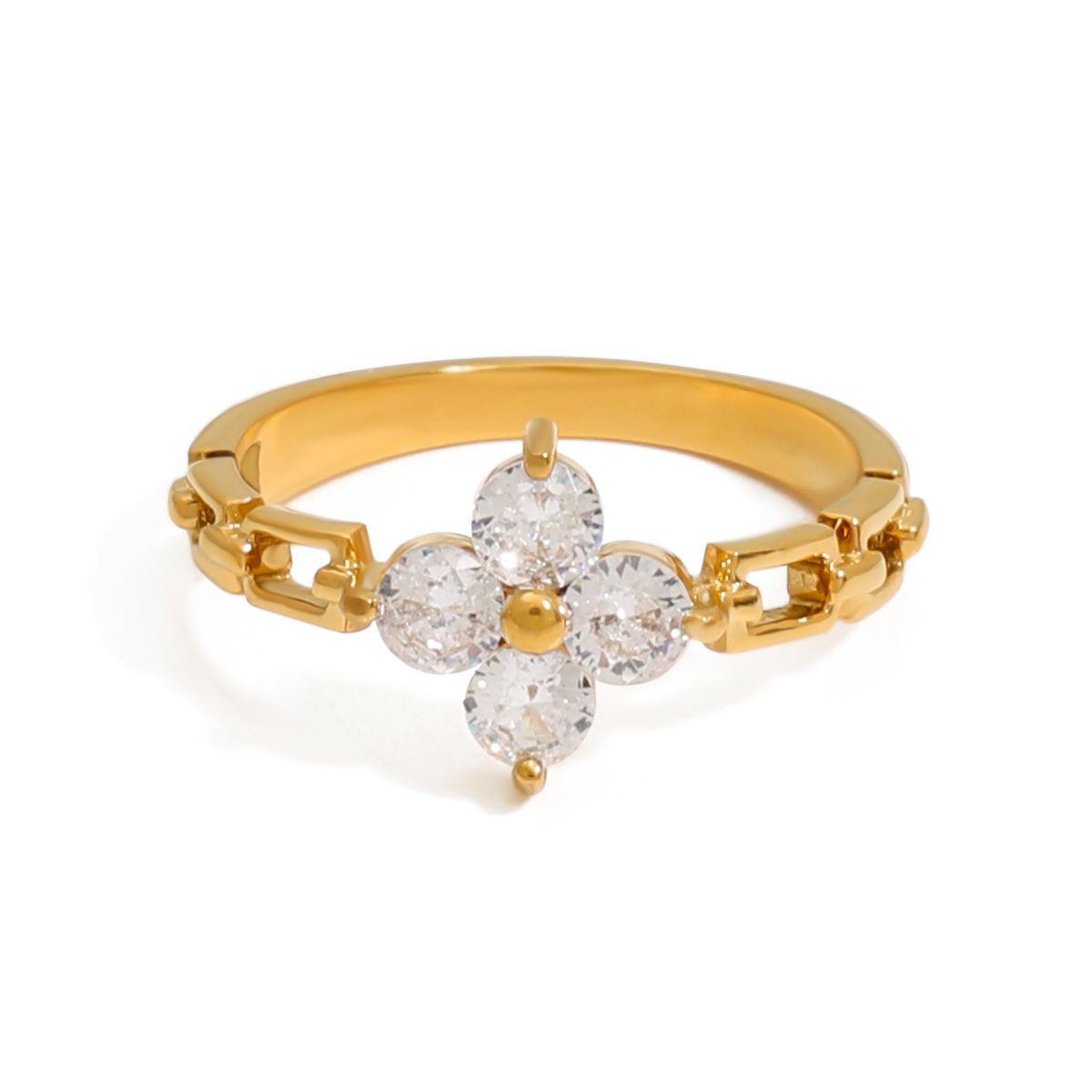Gold ring with diamond flower design on a white background