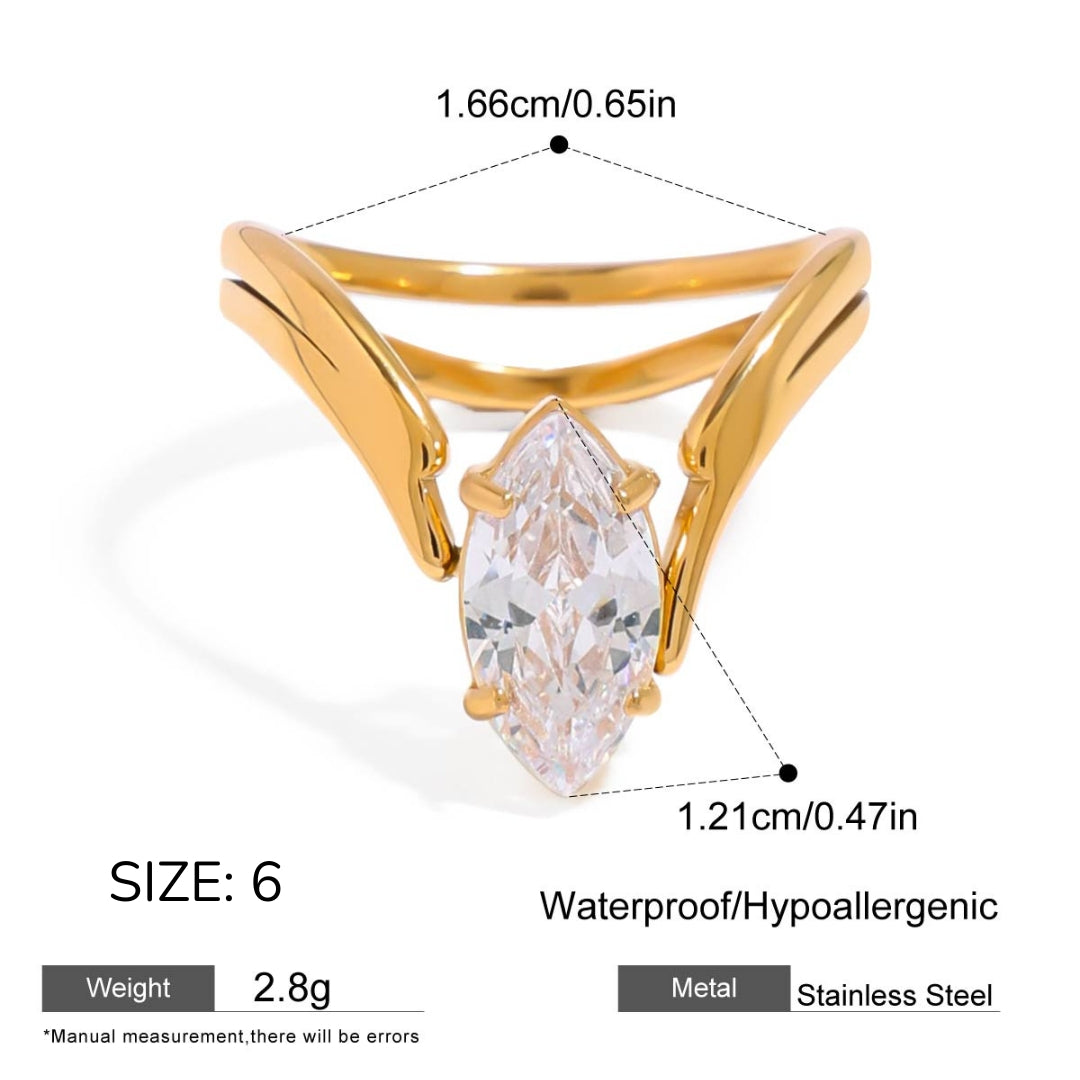Gold ring with a clear gemstone, showing measurements and material details on a white background.