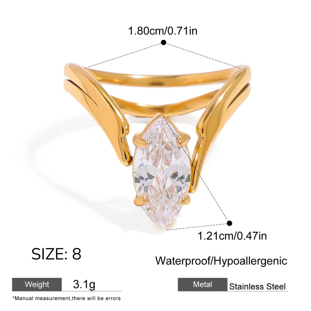 Gold ring with a clear gemstone, showing measurements and material details on a white background.