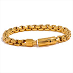 Gold chain bracelet on a white background